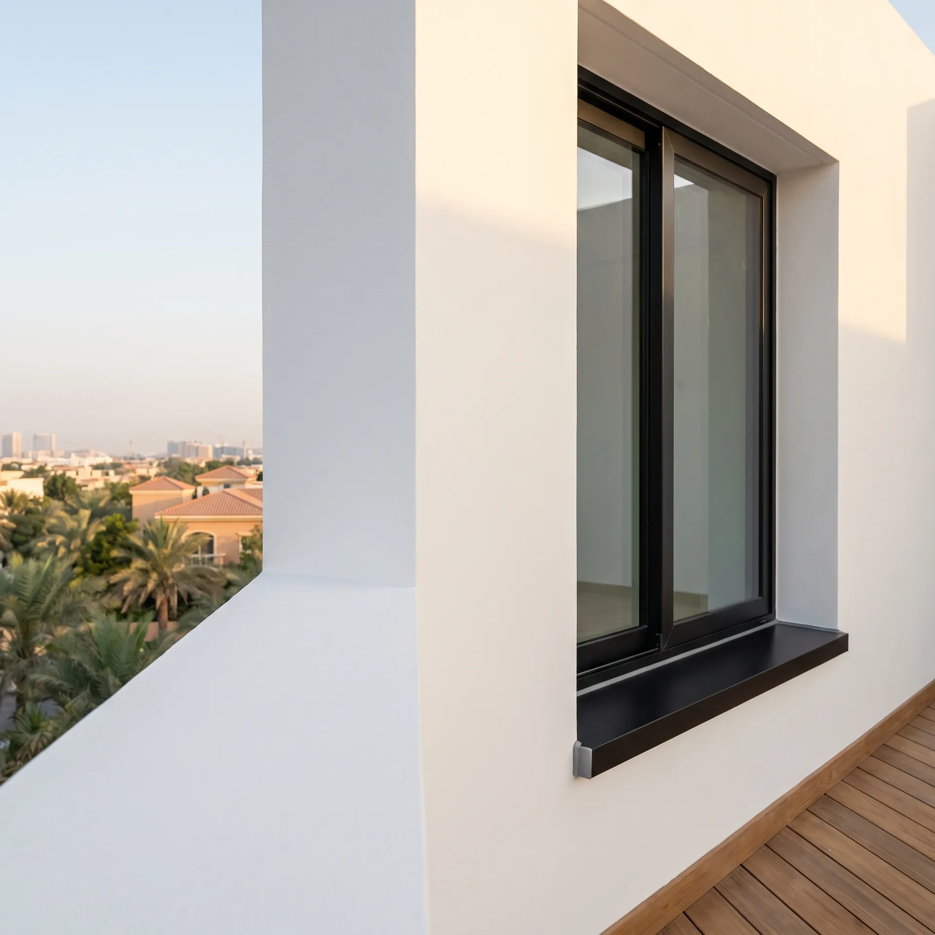 Finished window reveal and steel sill with city view